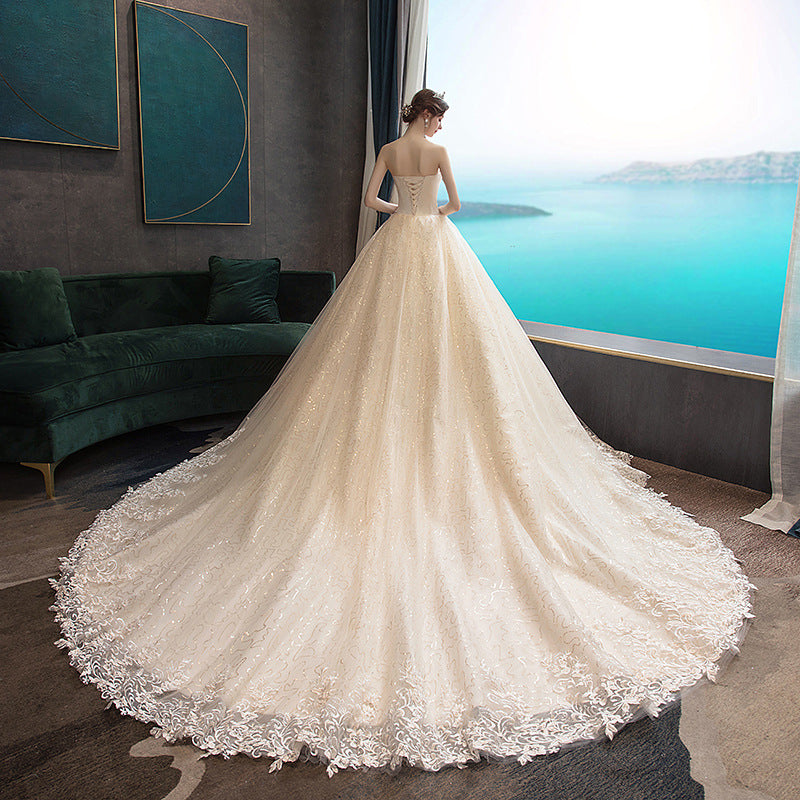 Wedding dress 2026 new bridal bandeau elegant trailing tail slimming simple and generous wedding when going out with a silk forest light wedding dress