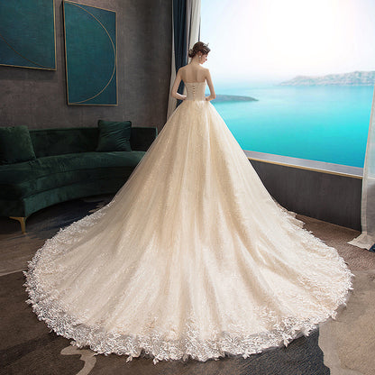 Wedding dress 2026 new bridal bandeau elegant trailing tail slimming simple and generous wedding when going out with a silk forest light wedding dress