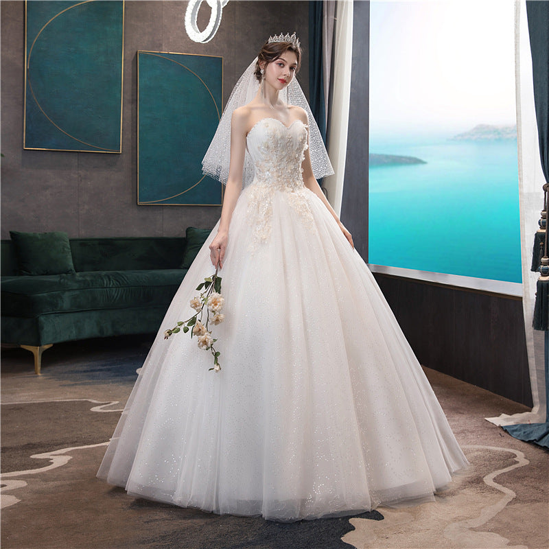 Wedding dress 2026 new bridal bandeau elegant trailing tail slimming simple and generous wedding when going out with a silk forest light wedding dress
