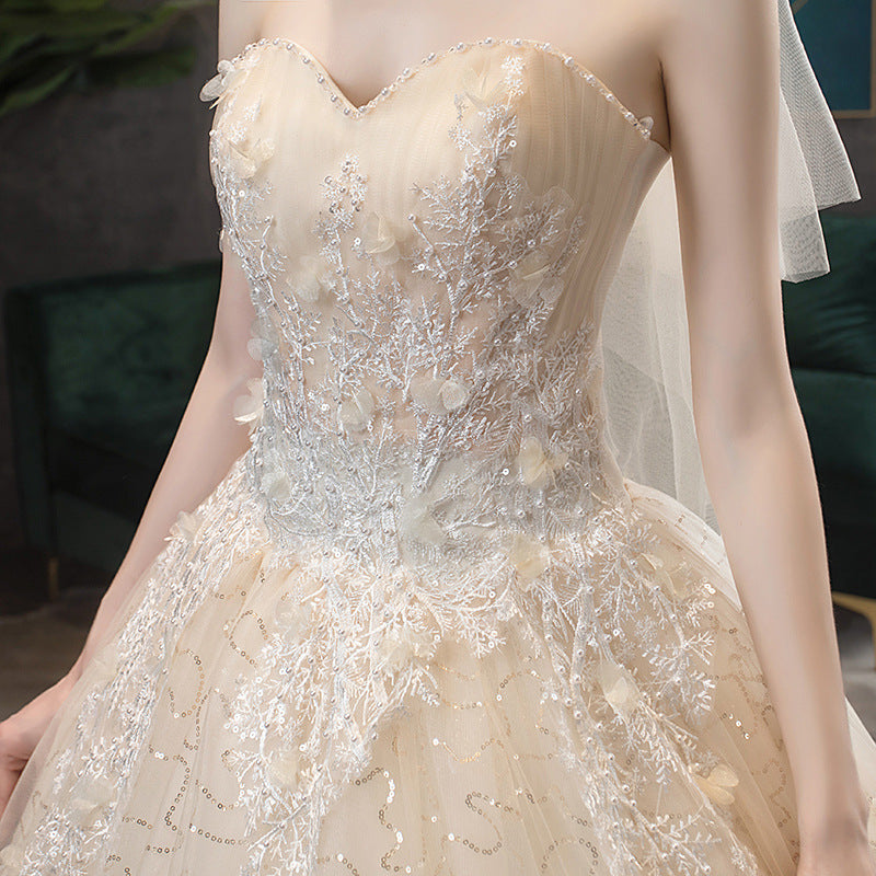 Wedding dress 2026 new bridal bandeau elegant trailing tail slimming simple and generous wedding when going out with a silk forest light wedding dress