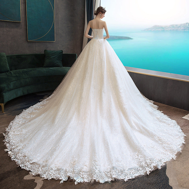 Wedding dress 2026 new bridal bandeau elegant trailing tail slimming simple and generous wedding when going out with a silk forest light wedding dress